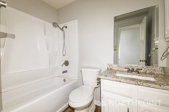 Building Photo - 3 BR/2BA | Newly Renovated Single Family Home | Fireplace in living room | Fenced backyard!