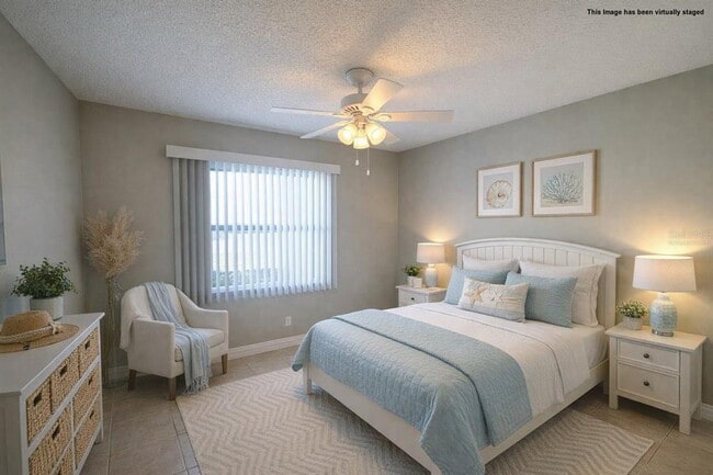 Building Photo - 6525 Manila Palm Way