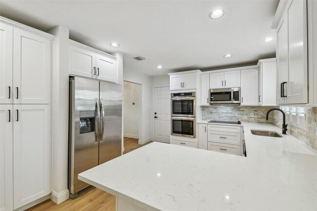 Building Photo - 4802 W Longfellow Ave