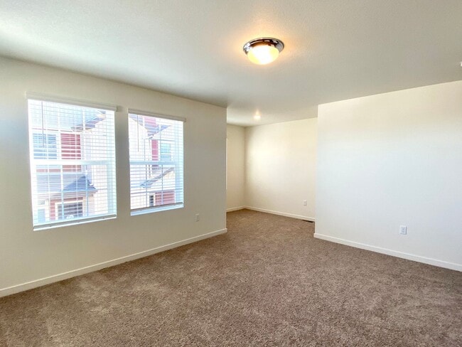 Building Photo - Beautifully built townhome in Banning Lewis Ranch ready Now!!