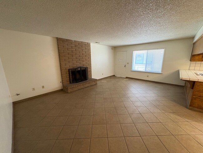 Building Photo - Move in ready apartment available now!