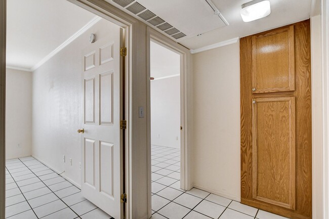 Building Photo - AMERICANA Property Mgmt - Gated 1st floor ...