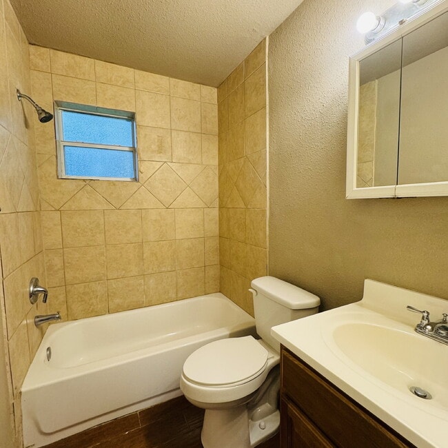 Building Photo - Welcome to Pine Shadows Duplex Apartment