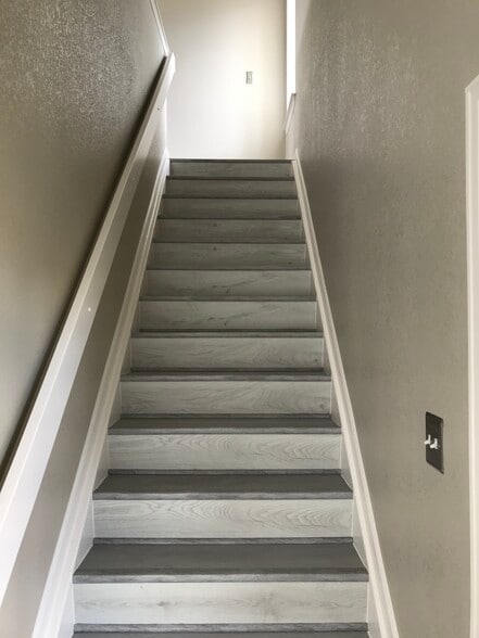 Inside stairs up to living space - 960 W 112th Ave