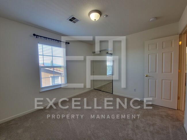Building Photo - Spacious 3/2.5 Located In Communication Hills, With Two 1 Car Garages, W/D & Large Master Retreat