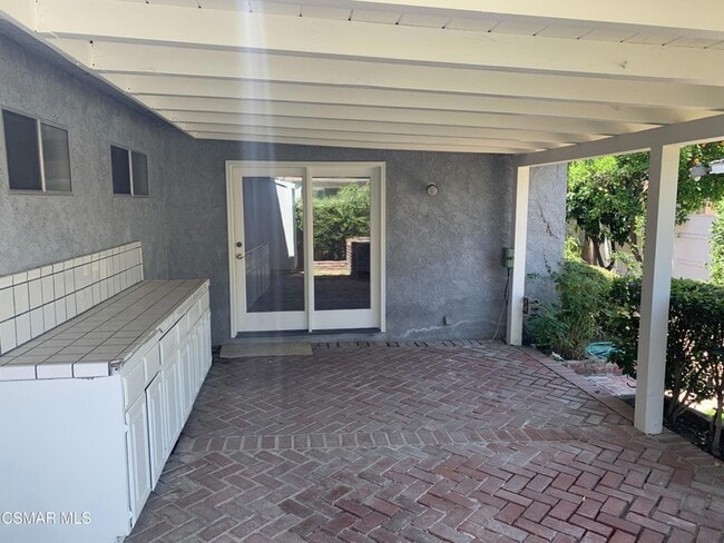 Building Photo - 7431 Cozycroft Ave