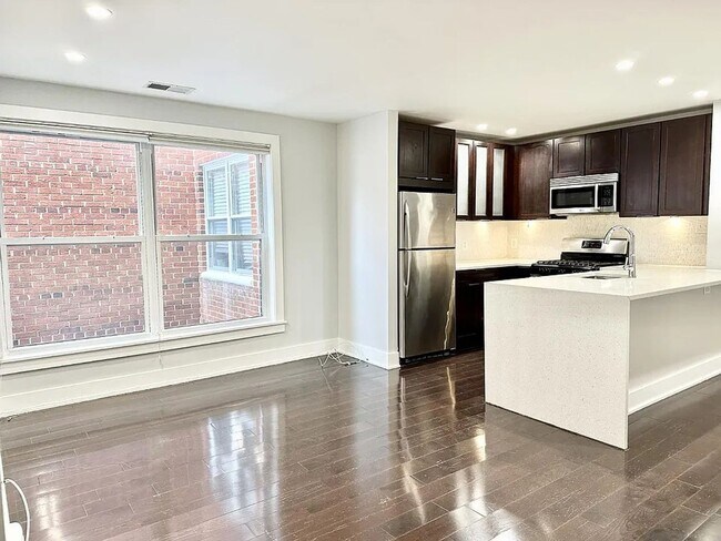 Building Photo - Sleek One-Bedroom in Eastern Market - Parking Spot Included!