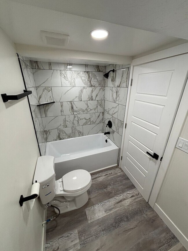 Building Photo - Beautifully Renovated 4-Bedroom Home with Finished Basement