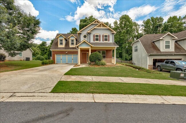 Building Photo - Welcome to this stunning 4-bedroom, 2.5-ba...