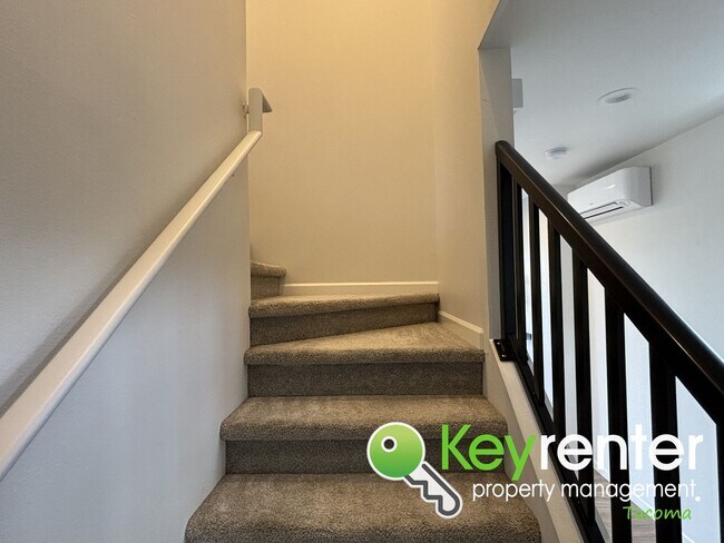 Building Photo - Stylish 4-Bedroom Home with Finished Basem...
