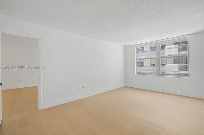 Building Photo - 5555 Collins Ave