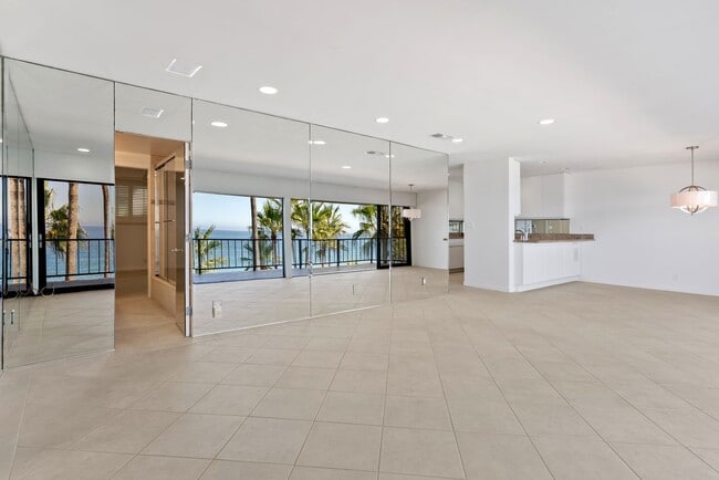 Building Photo - Discover a Coastal Sanctuary at Laguna Royale, Laguna Beach. Comes with 2 Parking Spaces!