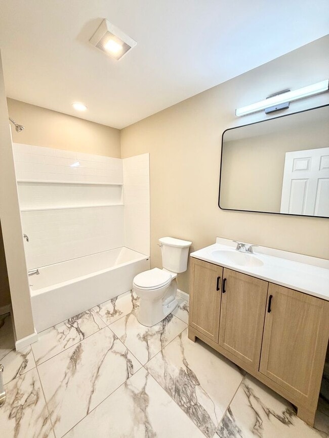 Building Photo - Updated 3-Bedroom Home on Tree-Lined Street with Off-Street Parking