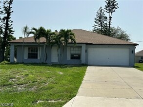 Building Photo - 613 NW 7th Ave