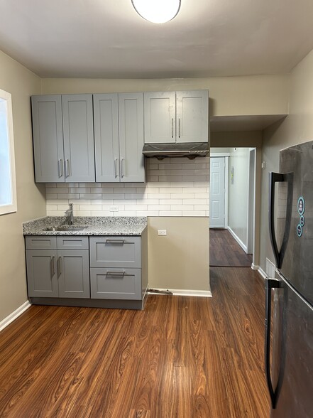 Building Photo - 3242 W 38th Pl