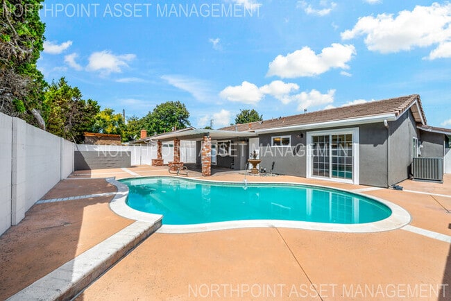 Building Photo - Brand New Remodel – Stunning Pool Home wit...