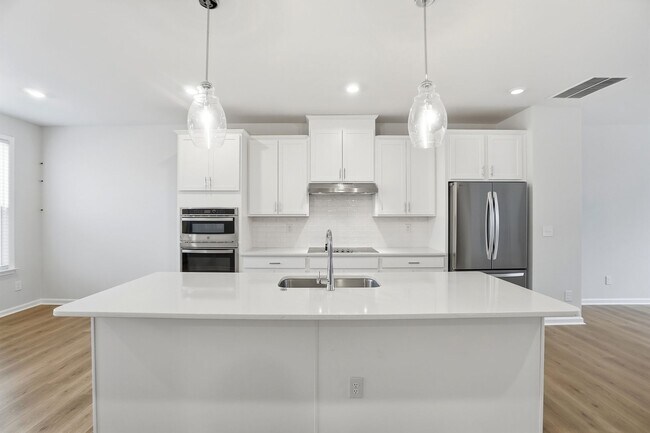 Building Photo - Brand-new three-story townhome in the University area at Senata at Research Park!