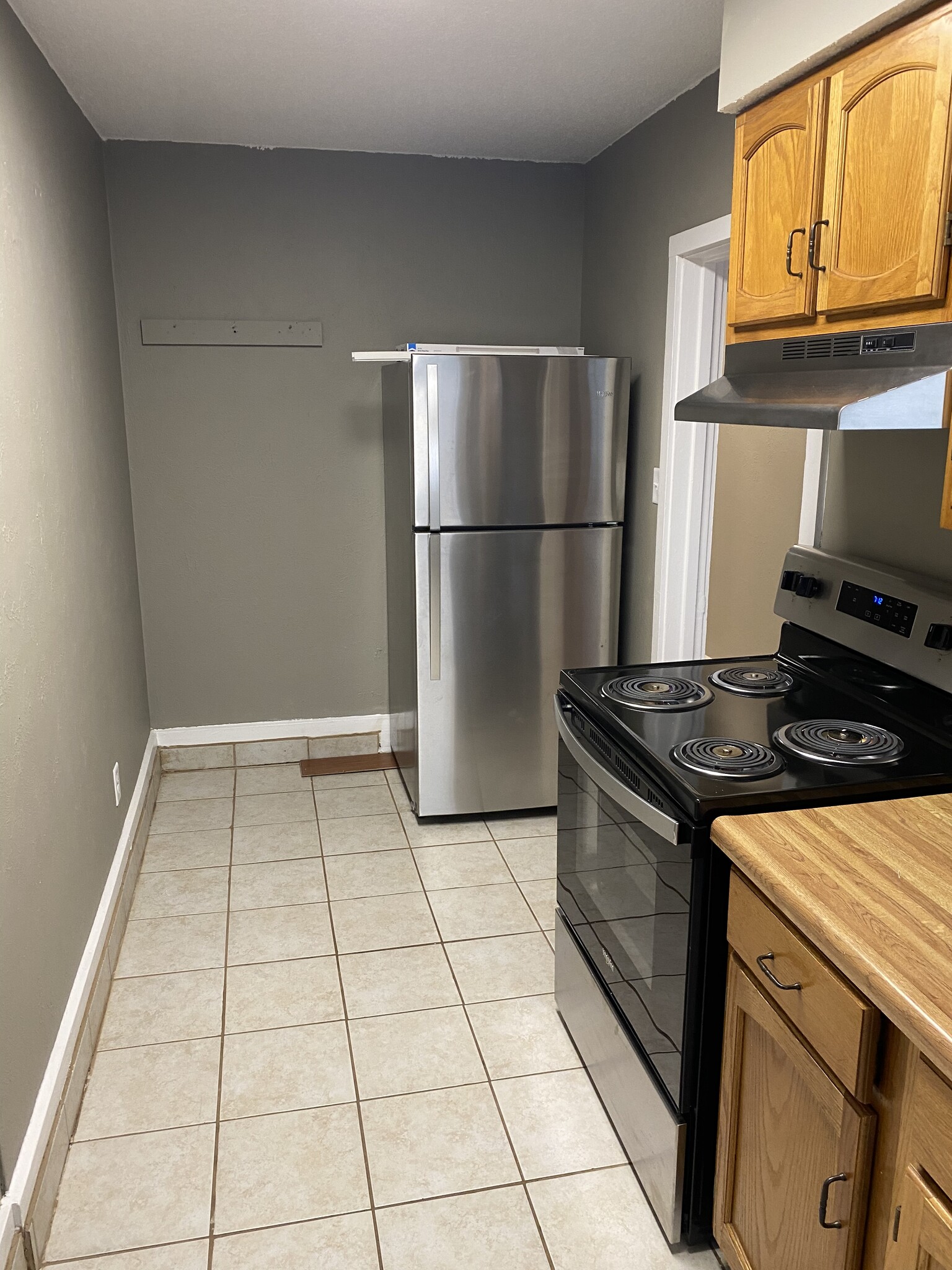 Kitchen - new refrigerator - 919 Massachusetts St