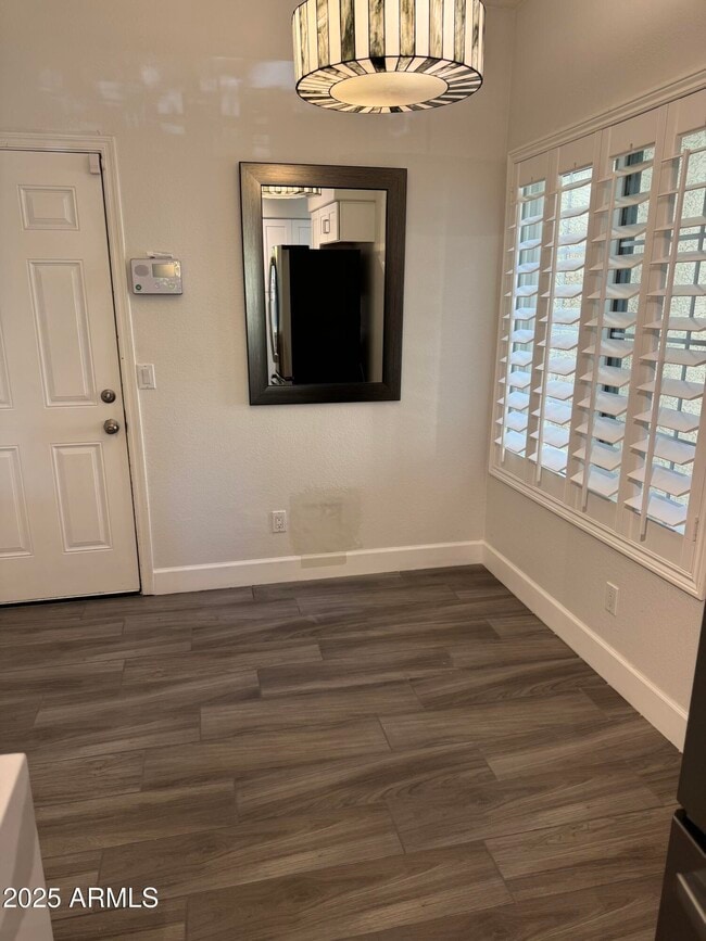 Building Photo - 7960 E Pepper Tree Ln