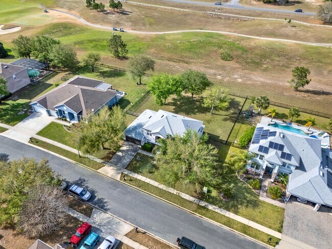 Building Photo - RENOVATED 5 BEDROOM FENCED IN, GOLF FRONTA...