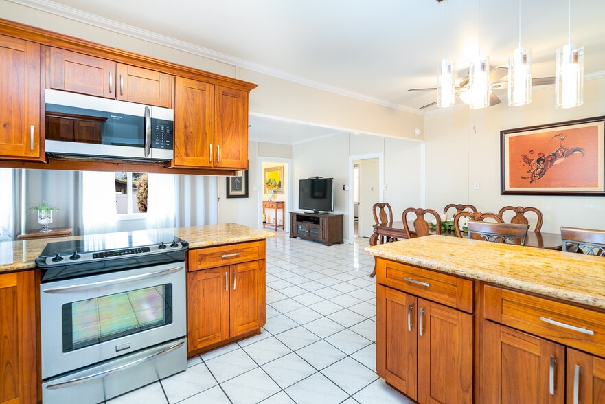 View from kitchen into living room. - 408 N Kainalu Dr
