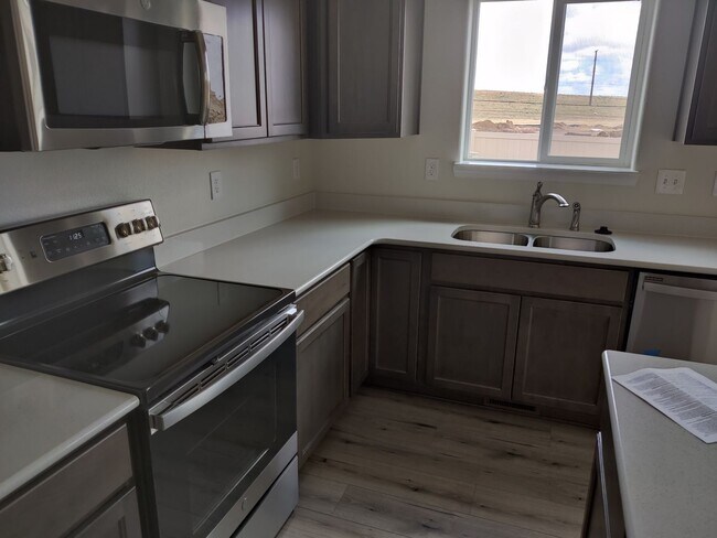 Building Photo - New Home in Enclaves - Close to Barnes Rd!