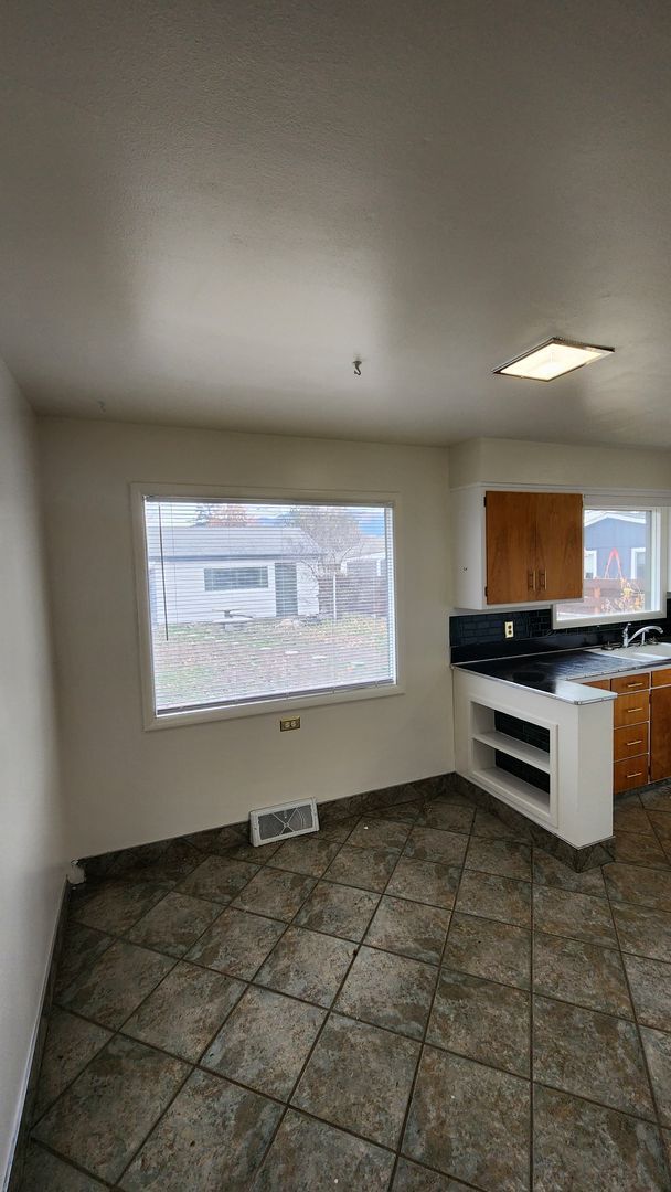 Building Photo - Centrally Located Three Bedroom House with...