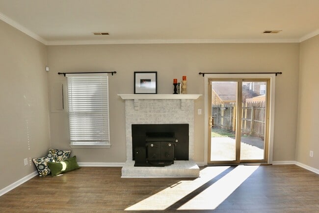 Building Photo - Updated End-Unit Brick Townhome Ready NOW!...