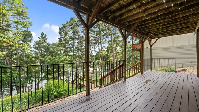 Building Photo - Serene Bella Vista Lakeside 4 bedroom