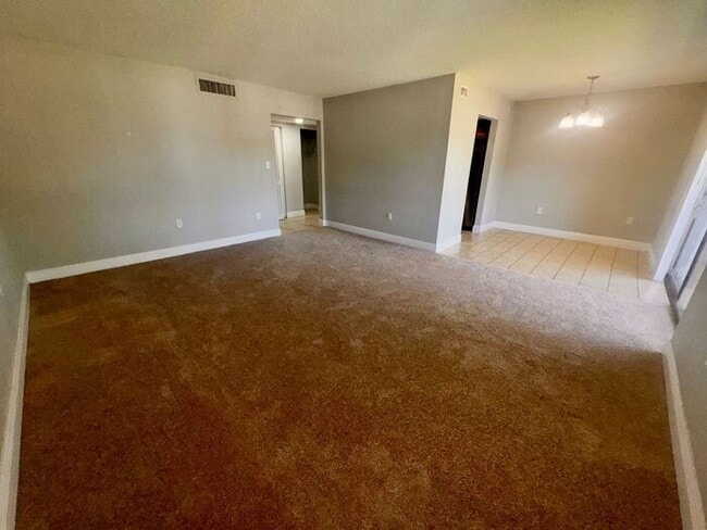 Building Photo - Spacious 3 Bed / 2 Bath Condo in Millennium Palms – Gated Community with Great Amenities!