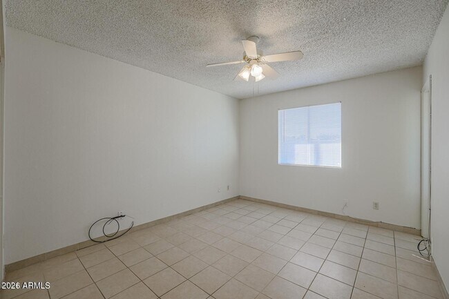 Building Photo - 3020 N 87th Ave