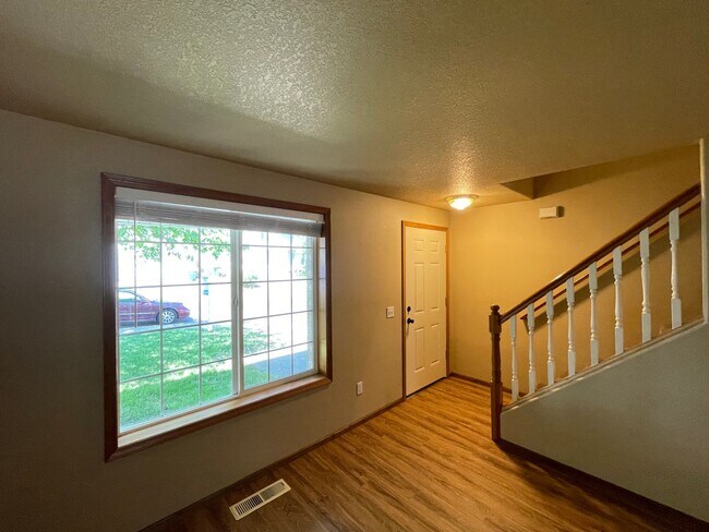 Building Photo - Spacious 4-Bedroom, 2.5-Bath Home with Deck, Fireplace & Updated Kitchen