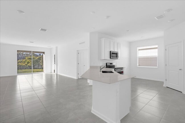 Building Photo - 4385 Pebbles Throw Dr