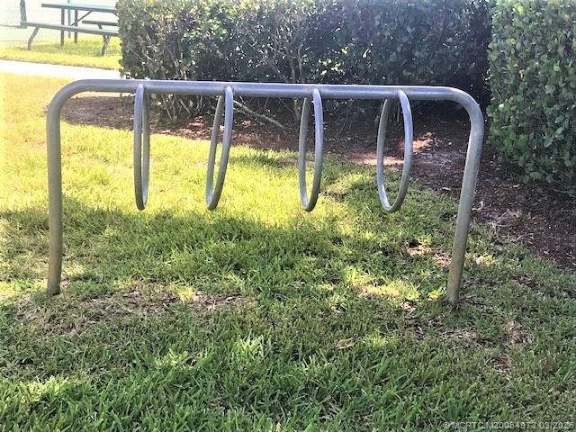 Building Photo - 3486 SW Pindo Palm Ln