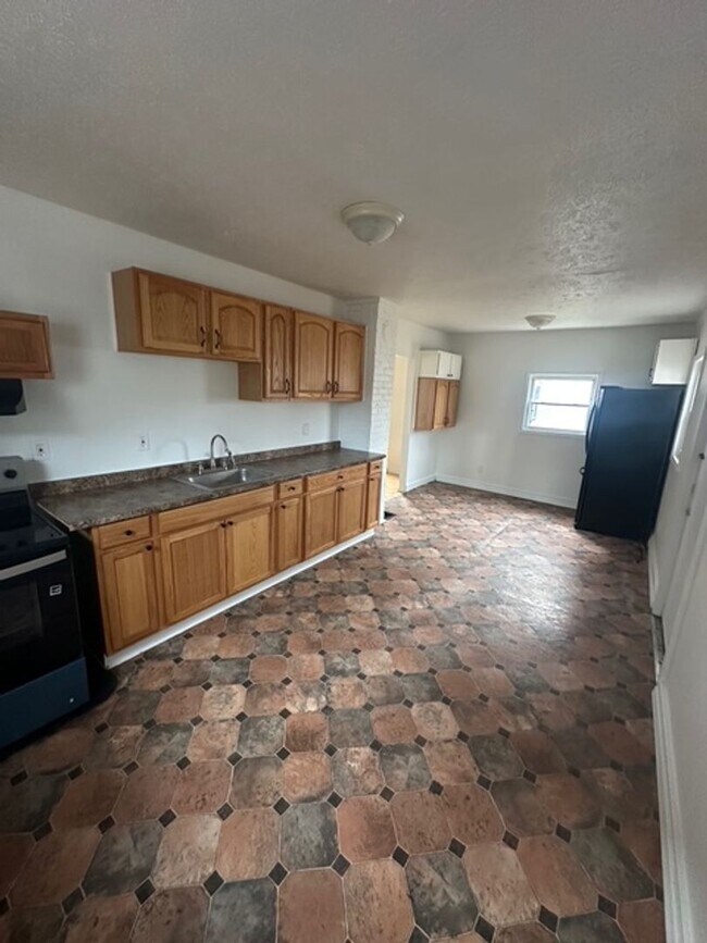 Building Photo - Charming 4-Bedroom Single-Family Rental in Rochester – Ready for Move In