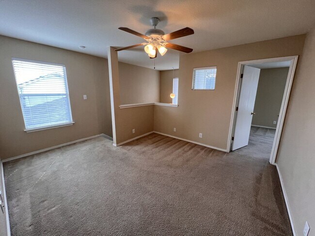 Building Photo - Generous Outdoor Space & Lawn Care Included!