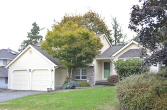 Building Photo - Private Summer Ridge Retreat with Vaulted Ceilings & Fenced Backyard