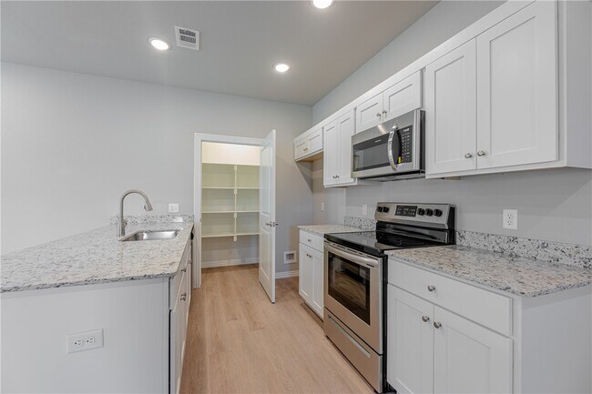 Building Photo - 1603 SW Casuarina Dr