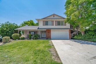 Building Photo - Spacious 4-Bedroom Home with Sun Room & Vi...