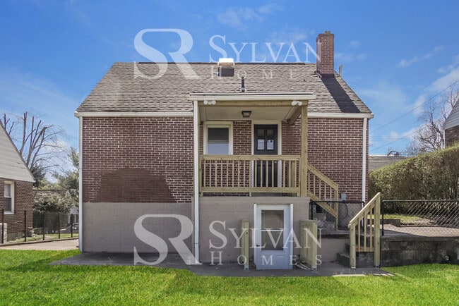 Building Photo - This home exudes a cheerful and welcoming charm!