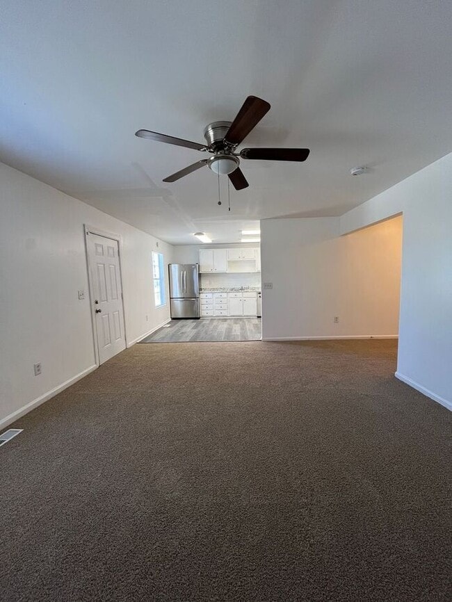Building Photo - Spacious 4-Bedroom Duplex with Modern Amen...