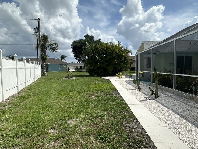 Building Photo - "Charming 3-Bedroom Home with Pool Oasis"