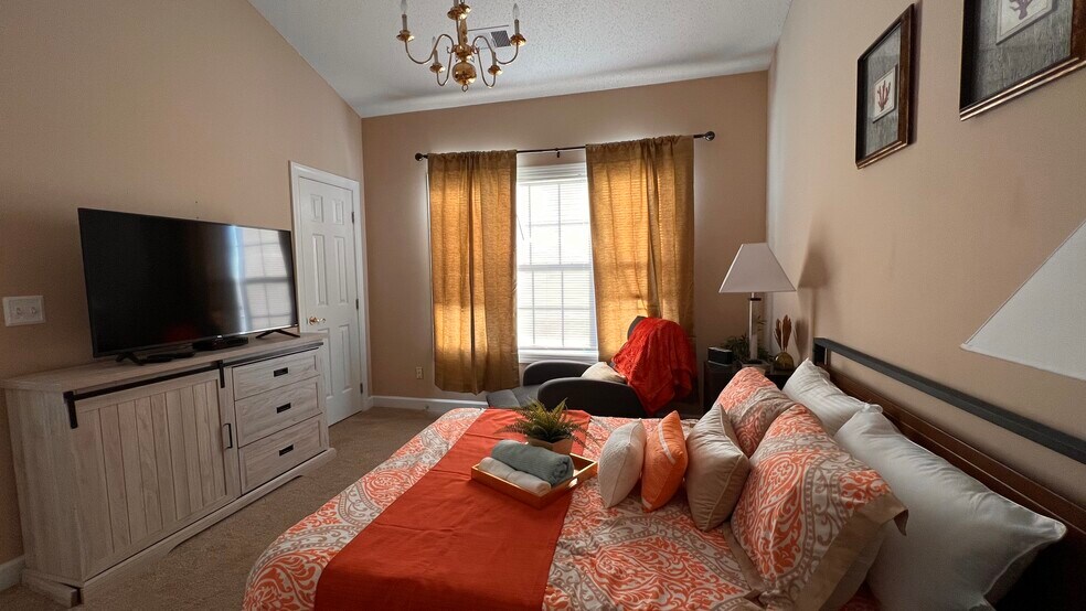 Master bedroom with TV - 3973 Forsythia Ct