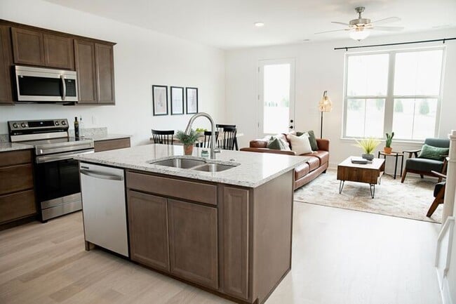 Building Photo - $1,000 MOVE-IN CREDIT! Stunning 3-Bed, 2.5-Bath Townhome at The Lily at Clover Ridge