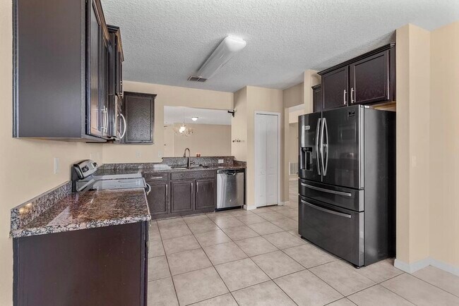 Building Photo - 7806 Tanbier Dr