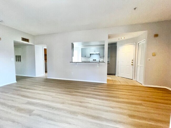 Building Photo - NEW-Remodeled bathroom & kitchen! NEW VINYL PLANK flooring & fresh paint! 2 bedroom 1 bath condo ...