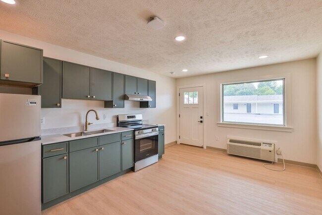 Building Photo - Modern Remodel with Designer Finishes | All Utilities Included