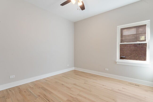 Building Photo - 6408 S Vernon Ave