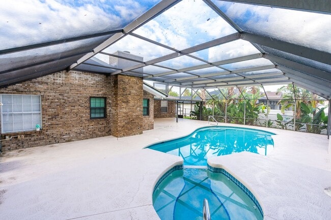 Building Photo - Executive Four-Bedroom Pool Home