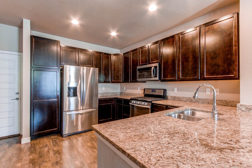 Ample cabinet storage - 1745 W 66th Ave